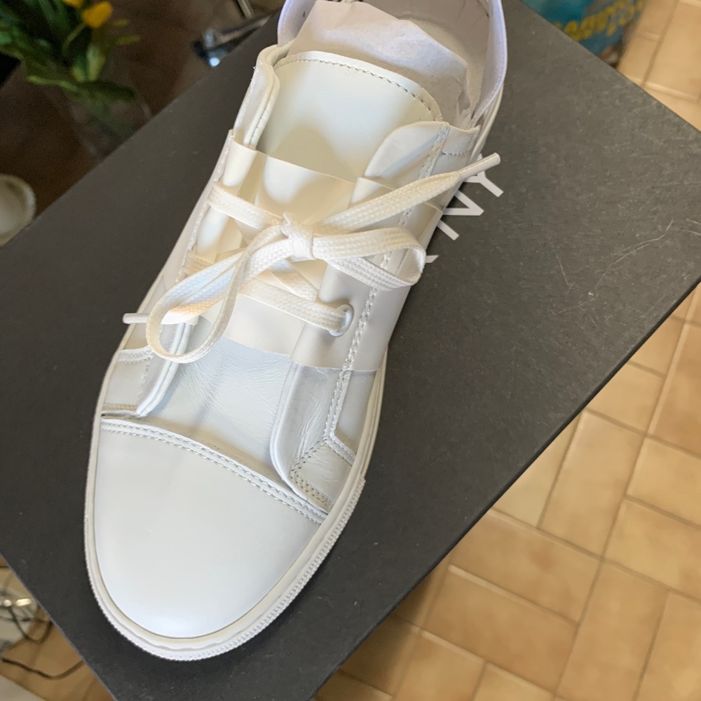 White sneakers open in the back